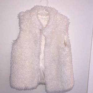Adorable white fur vest!